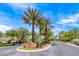 Red Rock Country Club entrance sign with well manicured landscaping at 11593 Glowing Sunset Ln, Las Vegas, NV 89135