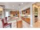 Well-equipped kitchen with granite countertops, stainless steel appliances, and spacious layout at 11593 Glowing Sunset Ln, Las Vegas, NV 89135