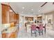 Well-appointed kitchen with granite countertops, center island, and stainless steel appliances at 11593 Glowing Sunset Ln, Las Vegas, NV 89135