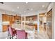 Modern kitchen with stainless steel appliances, granite counters, and center island at 11593 Glowing Sunset Ln, Las Vegas, NV 89135