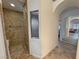 Gorgeous bathroom featuring tile shower with built-in niche and spa like stone detail at 1211 Bourbon St, Pahrump, NV 89048