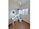 Half bathroom in garage features modern wood-look tile flooring at 1211 Bourbon St, Pahrump, NV 89048