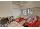 Bedroom with vaulted ceiling, ceiling fan, and closet with shutter-style doors at 1211 Bourbon St, Pahrump, NV 89048
