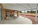 Spacious covered patio with ample seating and outdoor dining area at 1211 Bourbon St, Pahrump, NV 89048
