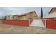 A secure gated yard surrounds this home, offering privacy and style at 1211 Bourbon St, Pahrump, NV 89048