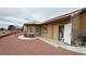 Cozy home exterior featuring well-maintained landscaping, charming windows, and a durable tile roof at 1211 Bourbon St, Pahrump, NV 89048