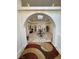 The home's grand foyer showcases a mermaid fountain, arched entryways, and an open design at 1211 Bourbon St, Pahrump, NV 89048