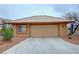 Detached two-car garage offers ample space and curb appeal at 1211 Bourbon St, Pahrump, NV 89048