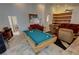 Spacious living room features a pool table, tile floors, and comfortable seating at 1211 Bourbon St, Pahrump, NV 89048