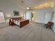 Large main bedroom featuring bed, ceiling fan, and carpet flooring at 1211 Bourbon St, Pahrump, NV 89048