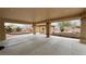Covered patio with outdoor access and landscaped yard at 1211 Bourbon St, Pahrump, NV 89048