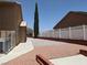 A gravel path and low-maintenance landscaping add to the beauty of this side yard at 1211 Bourbon St, Pahrump, NV 89048