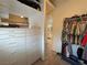 Spacious walk-in closet with custom shelving and drawers at 1211 Bourbon St, Pahrump, NV 89048