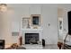 Elegant fireplace with stylish tile surround and contemporary decor at 1401 Red Crest Ln # 201, Las Vegas, NV 89144