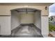 Spacious one car garage with an automatic door, ample space for parking and storage at 1401 Red Crest Ln # 201, Las Vegas, NV 89144