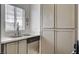 Kitchen sink with stainless steel faucet and fixtures, next to a stainless steel dishwasher at 1401 Red Crest Ln # 201, Las Vegas, NV 89144