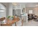 Cozy living space with a dining area and modern kitchen, perfect for entertaining at 1401 Red Crest Ln # 201, Las Vegas, NV 89144