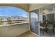 Charming patio overlooking the community, featuring a dining area perfect for enjoying the view at 1401 Red Crest Ln # 201, Las Vegas, NV 89144