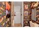 This full bath features colorful wallpaper, a stylish mirror, and a tiled shower at 1580 Rosita Dr, Las Vegas, NV 89123