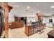 Open concept kitchen featuring granite countertops, custom cabinets, and a direct view into the living area at 1580 Rosita Dr, Las Vegas, NV 89123