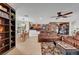 Open concept living room with direct access to the kitchen and dining room area at 1580 Rosita Dr, Las Vegas, NV 89123