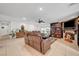 Spacious living room featuring tile flooring, a ceiling fan, and modern decorations and furniture at 1580 Rosita Dr, Las Vegas, NV 89123