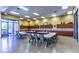 Host gatherings in the community room, featuring tables, chairs, and ample space for meetings and social events at 2580 Flare Star Dr, Henderson, NV 89044