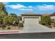 Charming single-story home features a well-maintained yard and an attached two-car garage at 2580 Flare Star Dr, Henderson, NV 89044