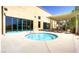 Unwind in the hot tub surrounded by a lovely patio, offering a relaxing and private oasis for residents at 2580 Flare Star Dr, Henderson, NV 89044