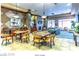 Stylish indoor lounge area with comfortable seating, a TV, and elegant decor at 2580 Flare Star Dr, Henderson, NV 89044