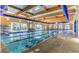 Take a refreshing dip in the indoor pool, featuring ample lighting and comfortable seating to lounge poolside at 2580 Flare Star Dr, Henderson, NV 89044