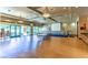 Multi-purpose meeting room with ample lighting, stage, and tables, perfect for large gatherings and presentations at 2580 Flare Star Dr, Henderson, NV 89044