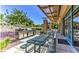 Enjoy outdoor cooking with a stainless grill and covered patio, perfect for barbecues and entertaining in the community at 2580 Flare Star Dr, Henderson, NV 89044
