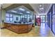 Inviting reception area with a service desk and a view of the library at 2580 Flare Star Dr, Henderson, NV 89044