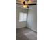 Bedroom with standard window, carpeted floors, and a ceiling fan for comfort at 259 E Van Wagenen St # 259, Henderson, NV 89015