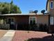 A single-story home with a well-maintained yard, offering curb appeal at 259 E Van Wagenen St # 259, Henderson, NV 89015