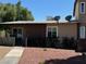 A single-story home with a well-maintained yard, offering curb appeal at 259 E Van Wagenen St # 259, Henderson, NV 89015