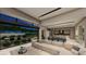 Bright open-concept living area with gourmet kitchen and access to outdoor living at 2630 Juniper Branch St, Las Vegas, NV 89117