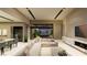 Open-concept design connects living and dining areas with views of the private pool at 2630 Juniper Branch St, Las Vegas, NV 89117