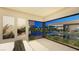 Light-filled main bedroom with pool view and art at 2630 Juniper Branch St, Las Vegas, NV 89117