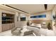 Light-filled main bedroom with seating area at 2630 Juniper Branch St, Las Vegas, NV 89117