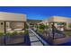 Contemporary home design with a striking pool reflecting the spacious layout and bright interiors, offering a luxurious living experience at 2630 Juniper Branch St, Las Vegas, NV 89117