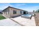 Backyard with pool, spa, and tiled patio area offering an inviting outdoor space at 3012 Joy Meadow Ave, Henderson, NV 89074