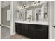 Stylish bathroom showcasing dual sinks, modern fixtures, and ample counter space at 3012 Joy Meadow Ave, Henderson, NV 89074