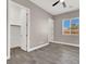 Bright bedroom with a closet, window with blinds, and neutral color palette at 3012 Joy Meadow Ave, Henderson, NV 89074