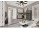 Cozy kitchenette with sleek cabinets, stainless steel appliances, and a modern design at 3012 Joy Meadow Ave, Henderson, NV 89074