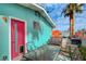 Outdoor patio area with seating and vibrant exterior paint, ready for entertaining at 3220 Pawnee Dr, Las Vegas, NV 89169