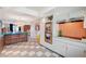 Open kitchen layout with stainless steel appliances and a view into the colorful living area at 3220 Pawnee Dr, Las Vegas, NV 89169