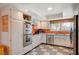 Kitchen with stainless steel appliances, ample storage, and a window providing natural light at 3220 Pawnee Dr, Las Vegas, NV 89169
