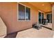 A covered back patio with a barbecue grill, ideal for outdoor gatherings and relaxation at 3903 Henny Ave, Las Vegas, NV 89141